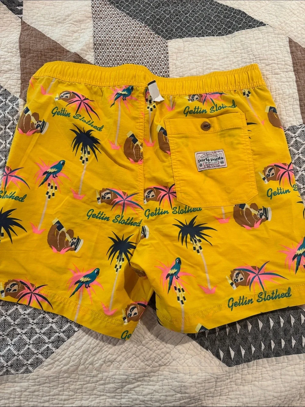 NWT Men’s Yellow Tropical Print Sloth Swim Shorts